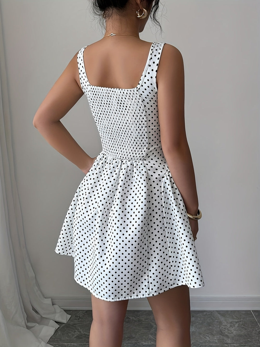 Elegant Short Dress with Polka Dots And a Square Neckline.